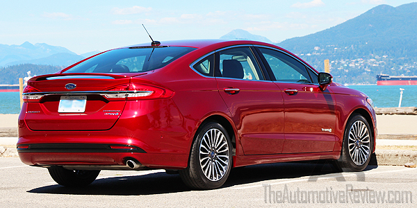 2017-ford-fusion-hybrid-titanium-ruby-red-exterior-rear-side